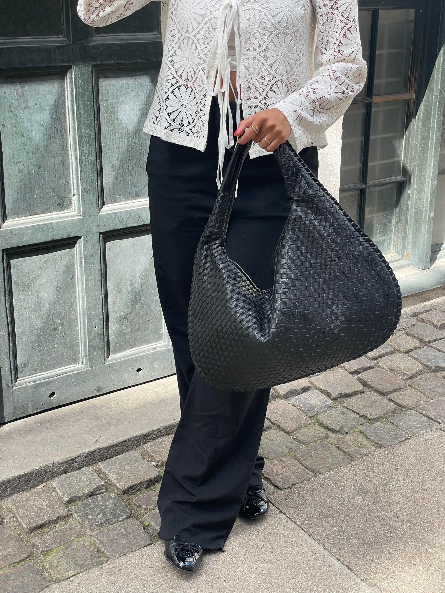 Trendige geflochtene Tasche